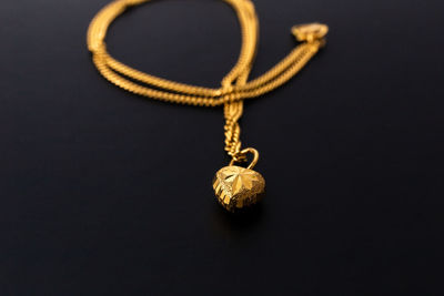 High angle view of heart shape on black background