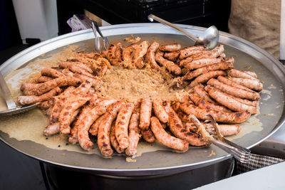 High angle view of meat on barbecue grill