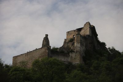 Low angle view of historic building against sky