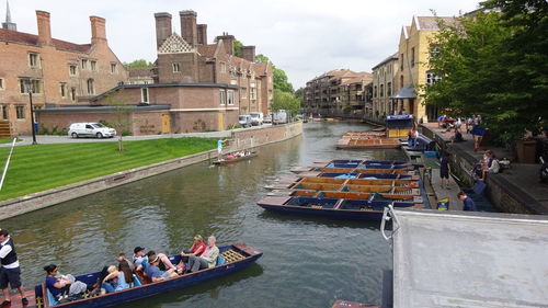 High angle view of boats moored on river in city