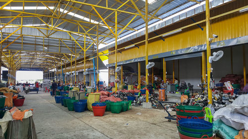 Group of people at market stall