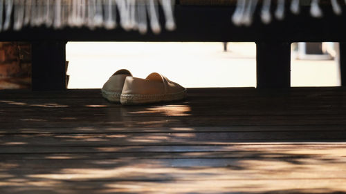 Close-up of shoes on table