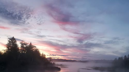 Low angle view of dramatic sky during sunset