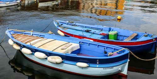 High angle view of boats moored in lake