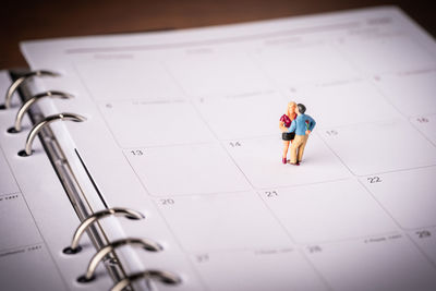 High angle view of mannequin on paper