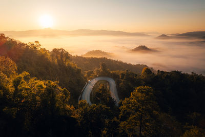 Scenic view of mountains against sky during sunset