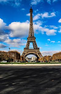 View of tower against cloudy sky