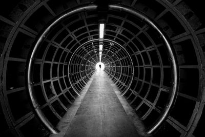 Person walking in tunnel