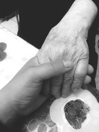 Close-up of hand feeding