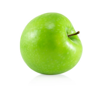 Close-up of apple against white background