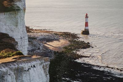 Lighthouse by sea