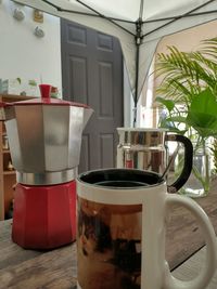 Close-up of coffee on table at home