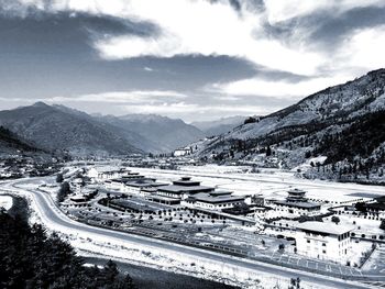 Aerial view of landscape against sky during winter