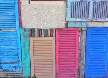 Closed blue door of building