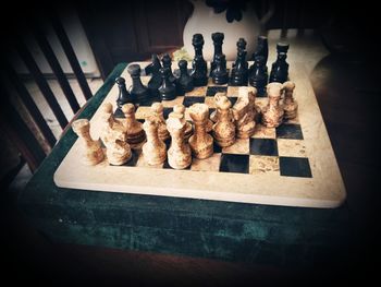 High angle view of chess board on table