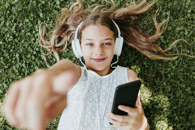 Portrait of girl using mobile phone