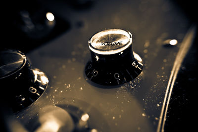 Close-up of electric guitar volume knobs