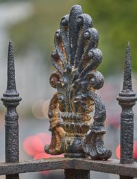 Close-up of statue against temple