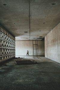 Man walking in corridor