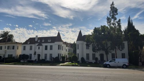 Panoramic view of buildings against sky in city