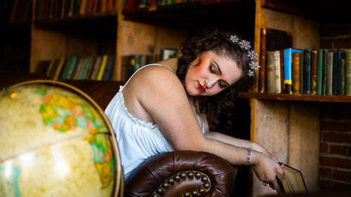 Side view of young woman looking away