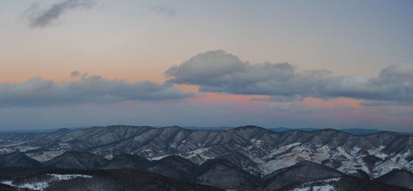 Scenic view of mountains against sky