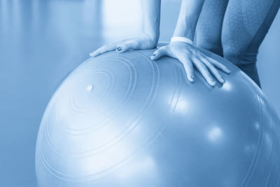 Midsection of woman with balloons