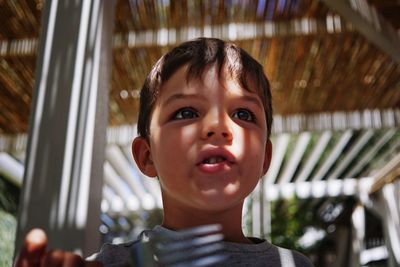 Portrait of cute boy looking away