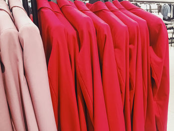 Full frame shot of colorful clothes hanging in store