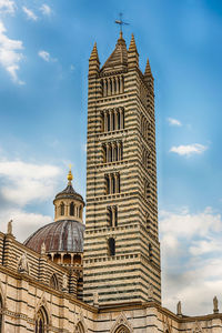 Belltower of the gothic cathedral of siena, tuscany, italy. 
