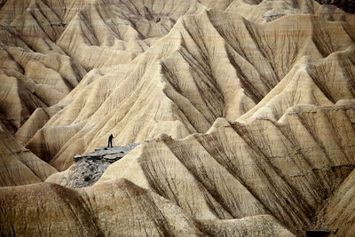 Photographer in desert of the bardenas reales in navarra