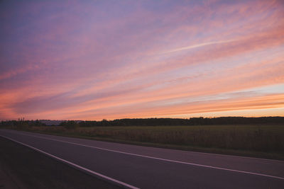 Road against sky at sunset
