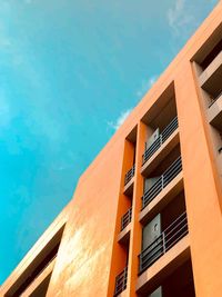 Low angle view of building against clear blue sky