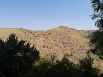 Scenic view of mountains against clear sky