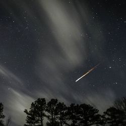 Low angle view of stars in sky at night