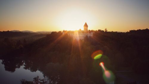 Panoramic view of buildings against sky during sunset