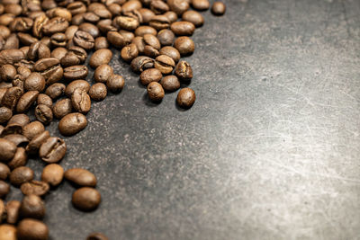 Close-up of coffee beans on table