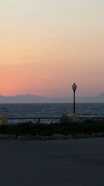 Scenic view of sea against clear sky during sunset