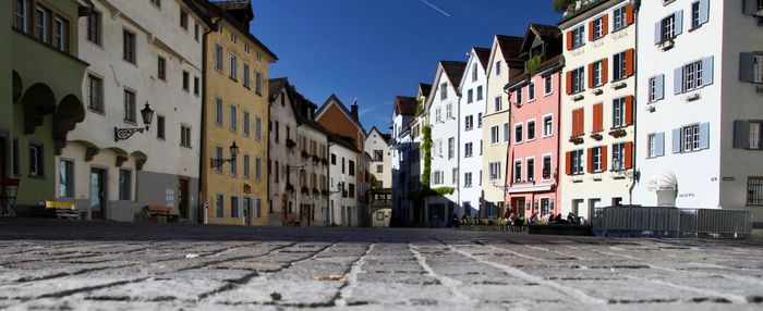 Street amidst residential buildings