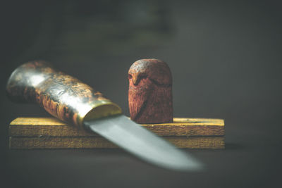 Close-up of metallic structure on table
