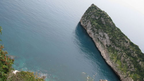 Tilt image of cliff in sea