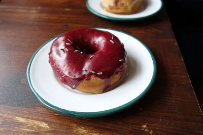 High angle view of donut in plate on table