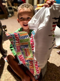 Portrait of happy boy playing