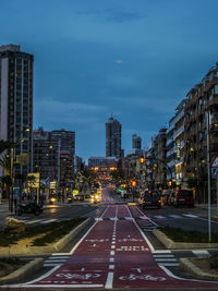 View of city street at dusk