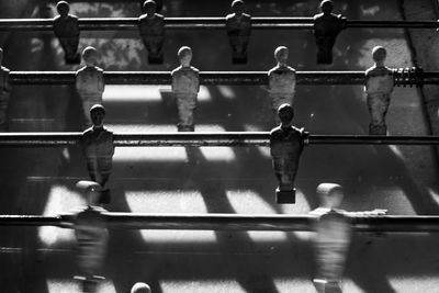 High angle view of metal railing in water