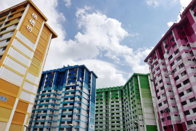 Low angle view of colorful buildings against sky