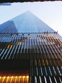 Low angle view of skyscraper against clear sky