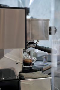 Close-up of coffee cup on table