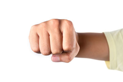 Midsection of man making face against white background