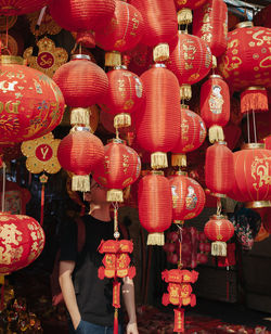 Close-up of lanterns hanging at market stall